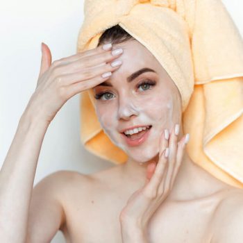 Woman cleansing skin - 10 Cleansing Tips