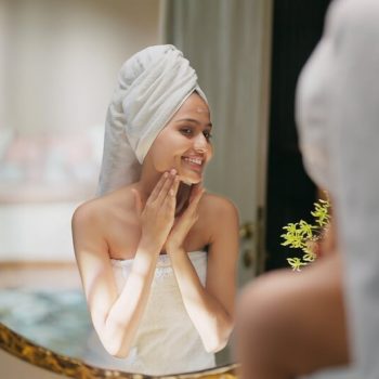 woman towel skincare