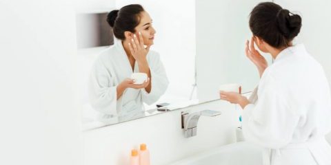 Woman doing winter skincare routine - Winter Skincare Routine Mistakes