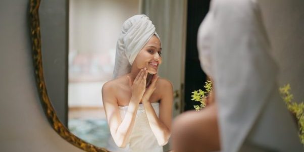 woman towel skincare